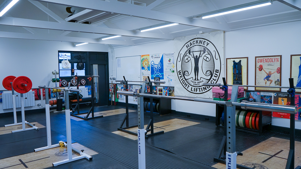 View of olympic barbell racks at Hackney Weightlifting Club